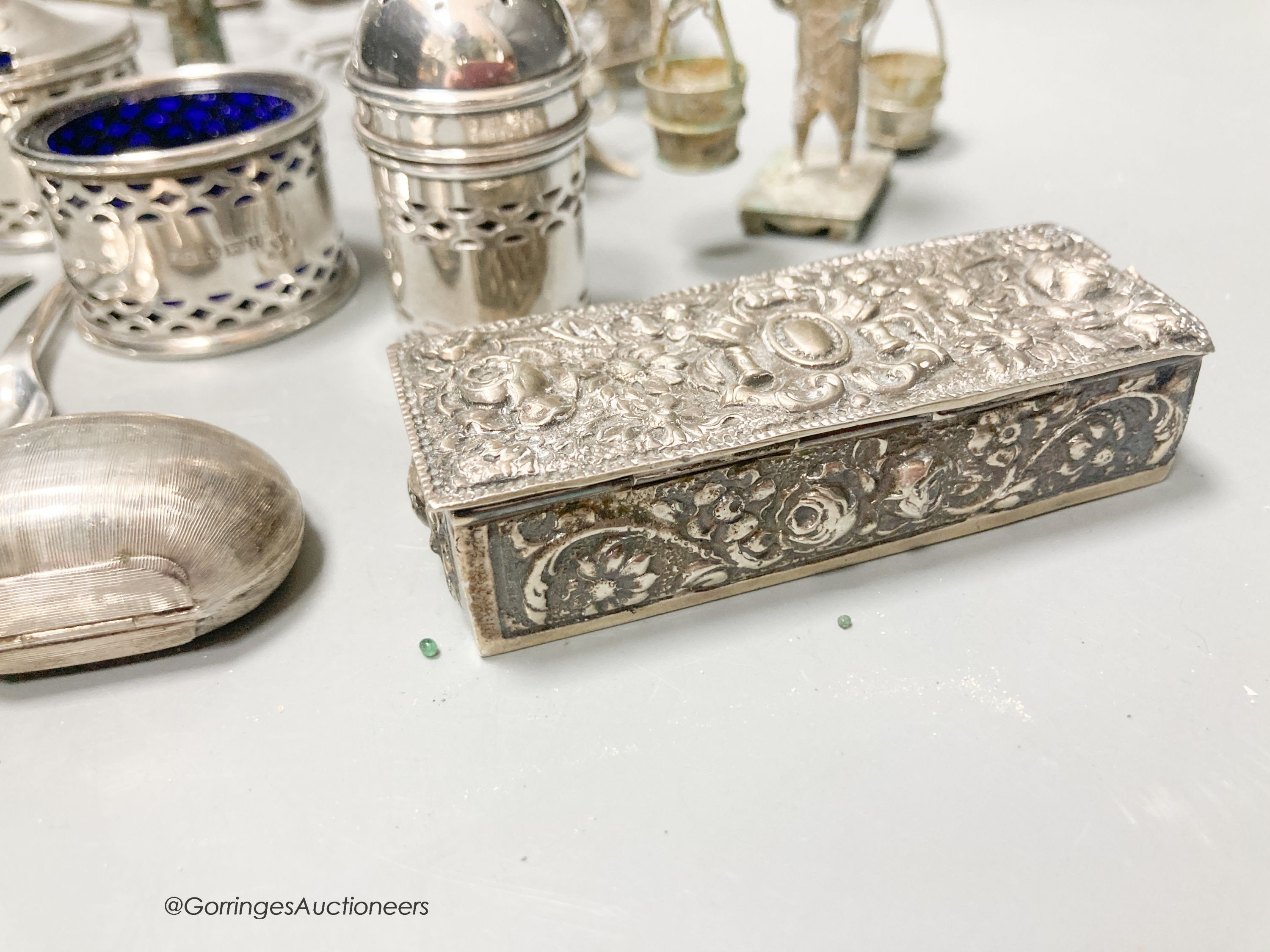 Sundry small silver including a pair of George III silver candle snuffers, Emes & Barnard, London, 1813, 17.4cm, another earlier pair, London, 1795, three silver condiments and other items.